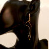 Boucles d'oreilles femmes pendantes en forme de jambe de femme plaqué or jaune