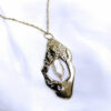 collier canopée médaille avec une perle naturelle en nacre couleur or jaune