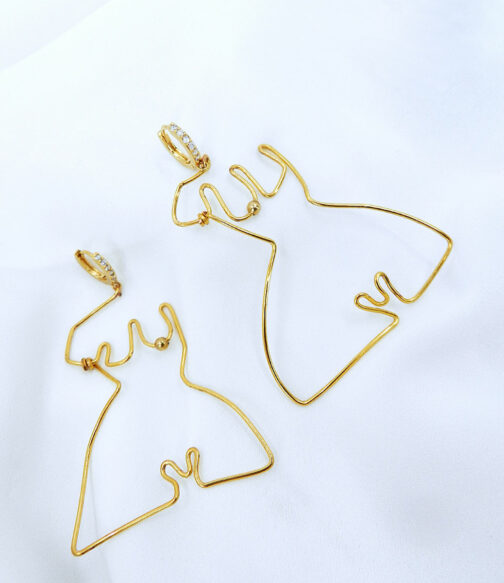 boucles d'oreilles en forme de corps de vénus couleur or jaune