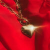 bijou en forme de coeur qui s'ouvre pour mettre une photo